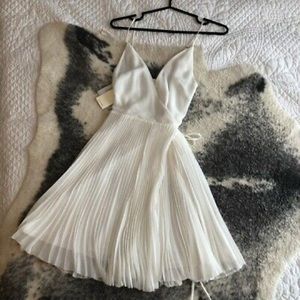 Mini white Wilfred wrap dress from aritzia